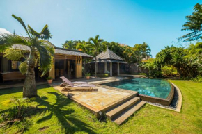 Villa sur le golf avec piscine et jardin tropical